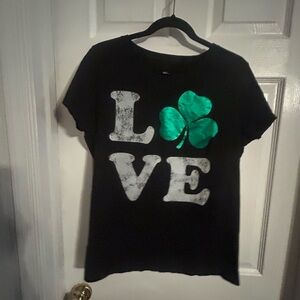 Black T-Shirt with Green Shamrock and White Letters